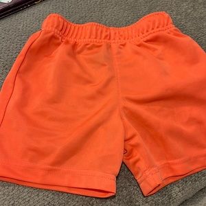 Boys orange nylon shorts size 18 to 24 months
